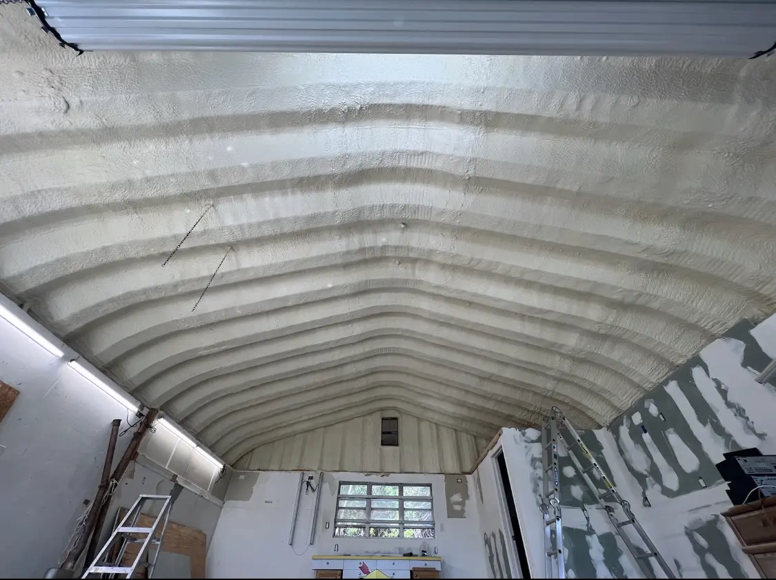 Spray polyurethane foam applied to the underside of a metal roof deck in Hickory Hills